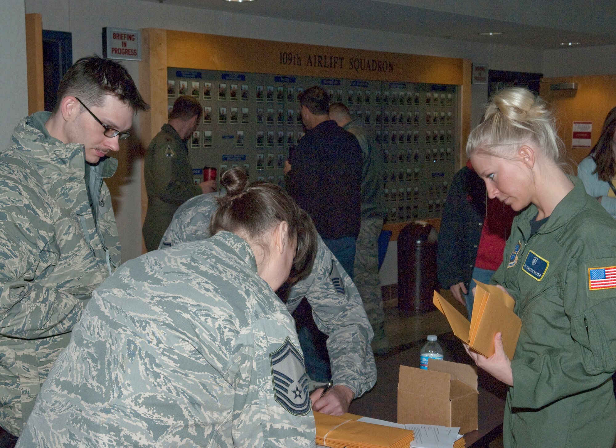 Medical specialists review the records with deployers from the 133rd Airlift Wing at the St. Paul Air National Guard base on May 1, 2010. Airmen departed for duty in Southwest Asia as the Minnesota Air National Guard's C-130 unit takes another turn in the combat zone. USAF photo by Senior Master Sgt. Mark Moss (Released)