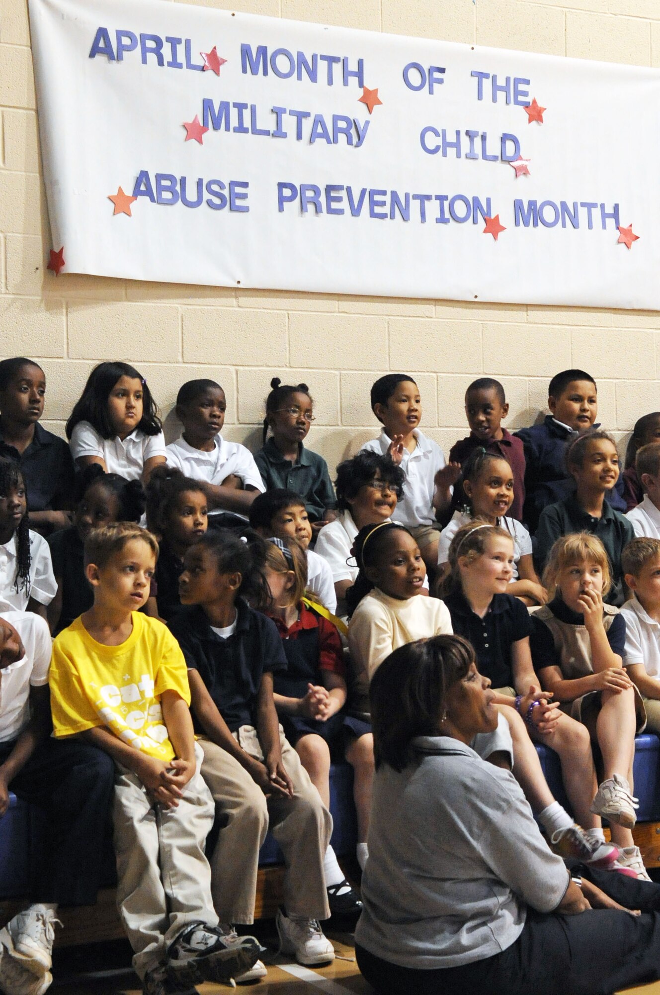 BARKSDALE AIR FORCE BASE, La. -- Children at the Barksdale Youth Center chime in as Year of the Air Force Family guest speaker, Trevor Romain, asks questions April 29. Mr. Romain is an award-winning author and illustrator of a series of self-help books for children. The youth got a sneak peek at Mr. Romains latest video "With you all the way, dealing with deployment."  (U.S. Air Force photo by Senior Airman La’Shanette V. Garrett) (RELEASED)