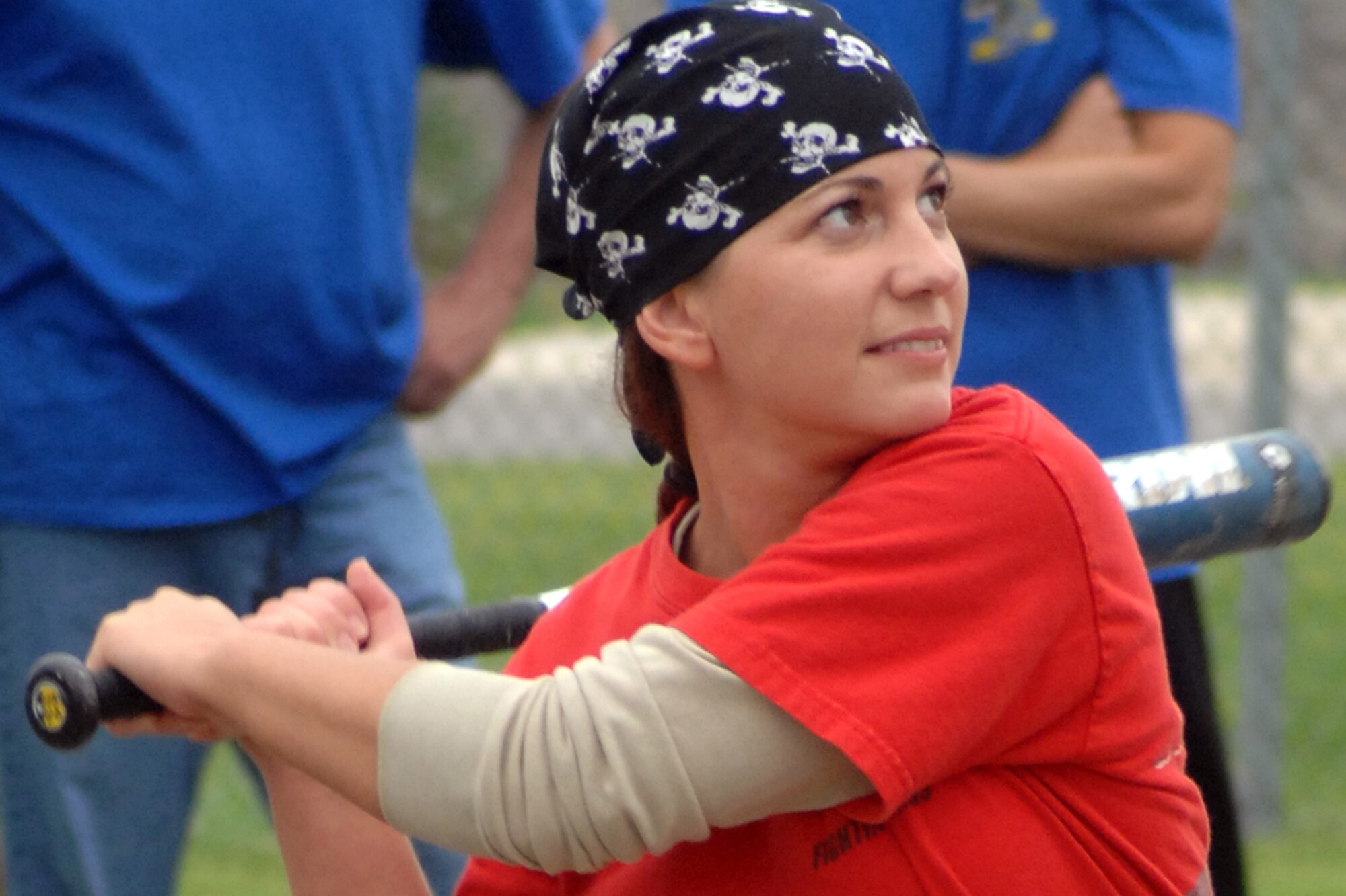 GRISSOM AIR RESERVE BASE, Ind., -- Vicki Cummings, a boom operator with the 74th Air Refueling Squadron, watches a pitch closely before deciding to swing during an annual softball game between the two flying squadrons. (U.S. Air Force photo/Tech. Sgt. Doug Hays)