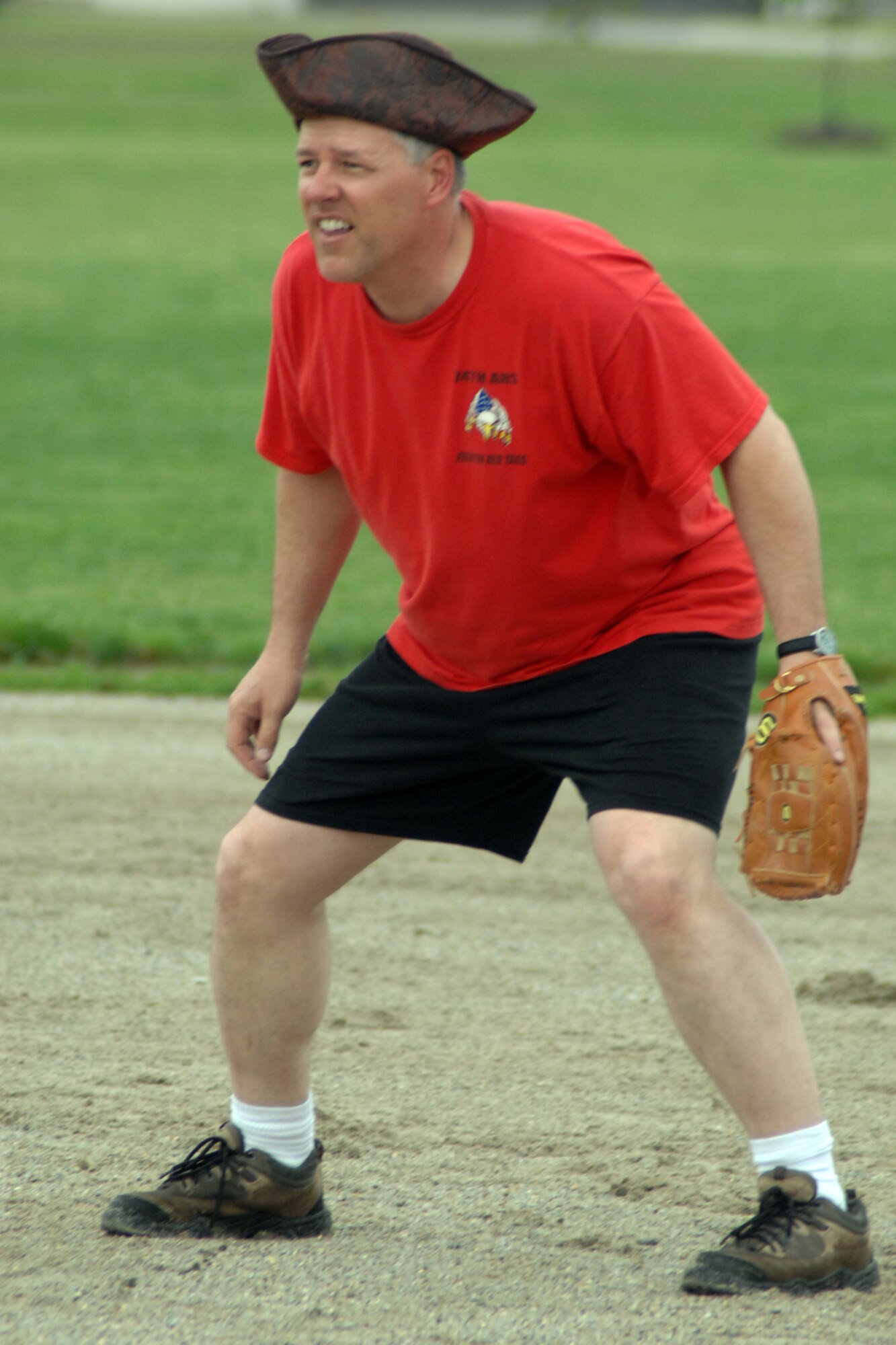 GRISSOM AIR RESERVE BASE, Ind., -- Paul Wietbrock, 74th Air Refueling Squadron commander, positions himself to make a play at second base during an annual softball game pitting the 74th ARS "Fighting Red Tags" against the 72nd ARS "Dark Side". The Dark Side got the best of the Red Tags 10-8. (U.S. Air Force photo/Tech. Sgt. Doug Hays)