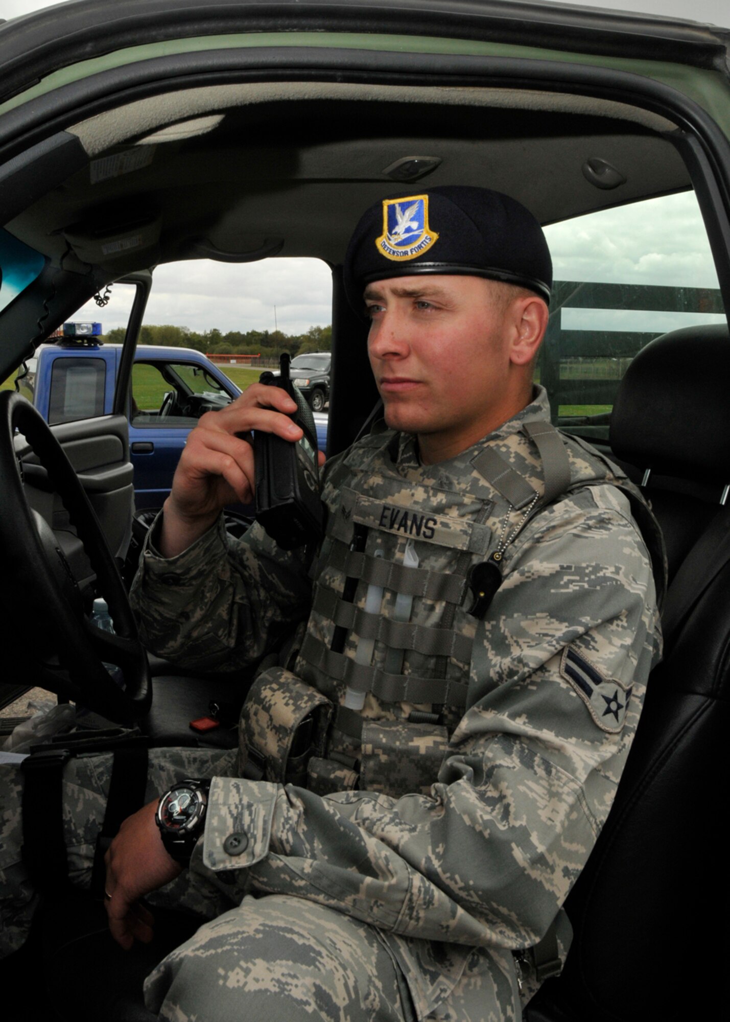 Airman 1st Class Steven Evans, 48th Security Forces Squadron security response member, radios in to the law enforcement desk while on security at RAF Lakenheath, England, May 4. Airman Evans was nominated for a liberty spotlight because he epitomizes 'Service Before Self'. (U.S. Air Force photo/Airman 1st Class Knox)