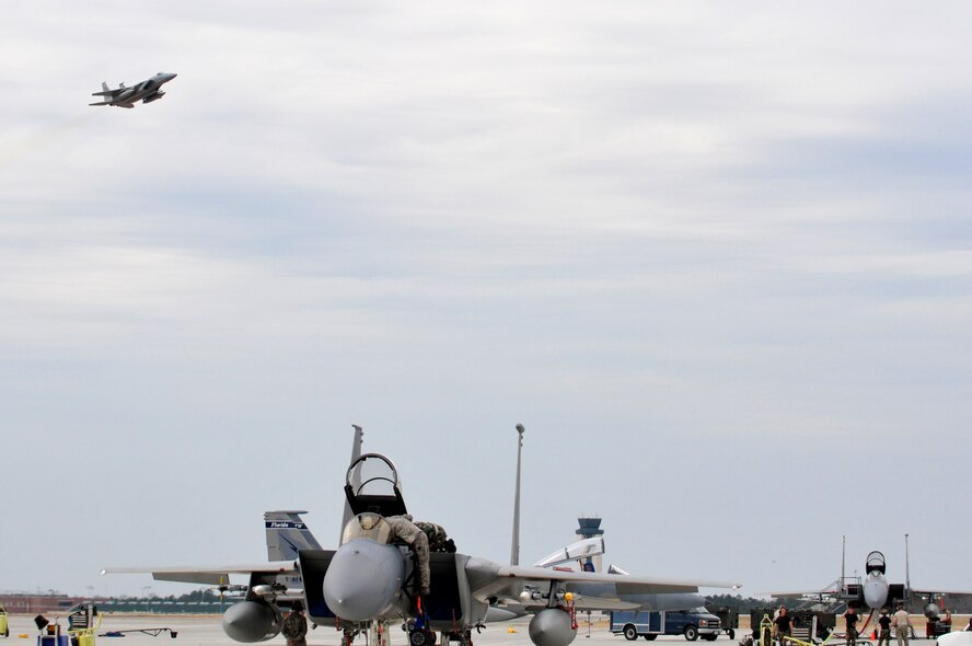 An F-15 from the 125th Fighter Wing, takes off from the Combat Readiness Training Center (CRTC), Savannah, GA, March 10, 2010. The 125th Fighter Wing's deployment to Savannah CRTC March 7-March 19, 2010, was a rare opportunity for our F-15 pilots to fly Large Force Employment missions (LFE's), with other units and for wing members to build camaraderie on and off duty. (Air Force Photo by Tech. Sgt. Shelley Gill)