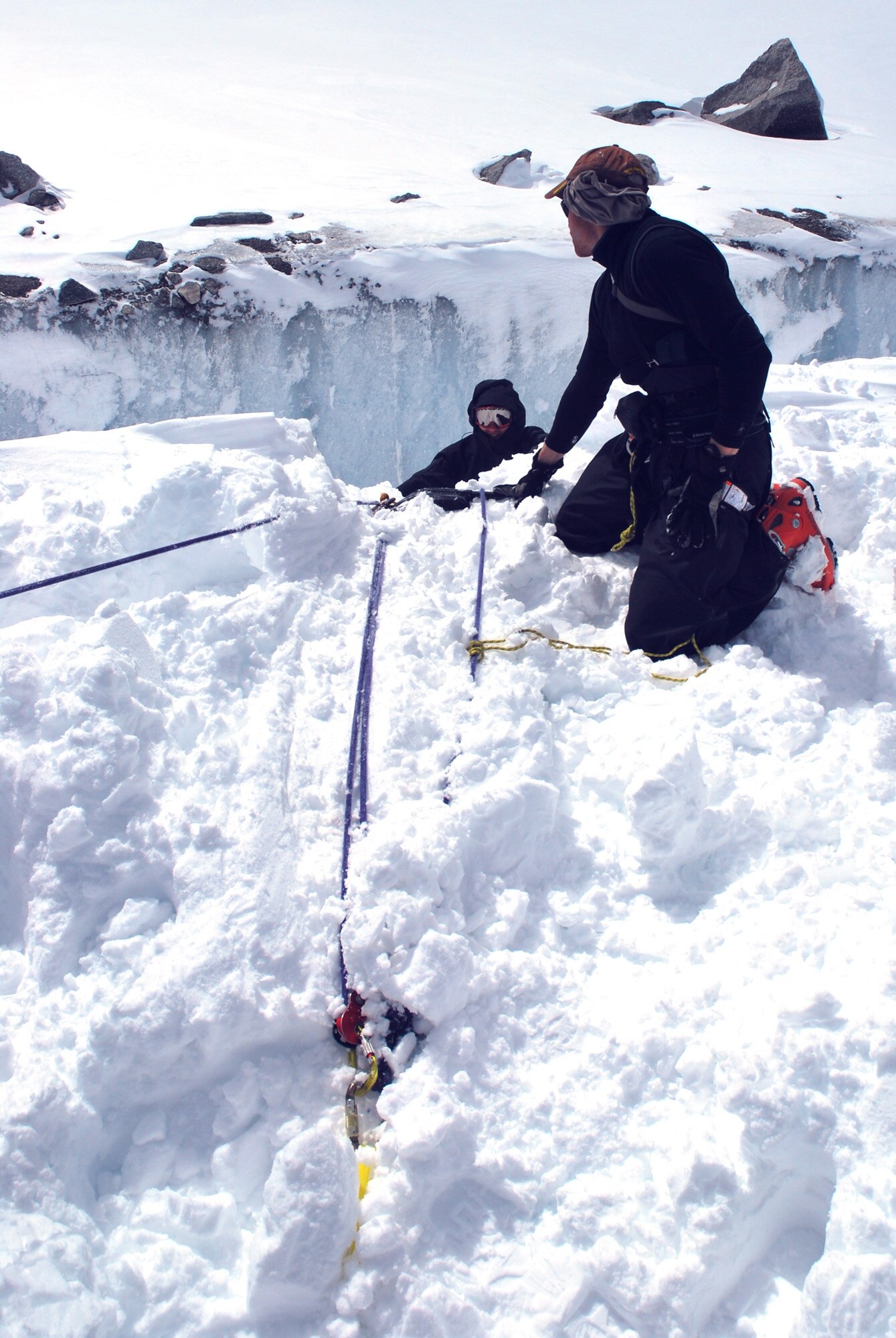 Pararescuemen from the 56th Rescue Squadron, RAF Lakenheath, England practice crevasse rescue training in the mountains above Chamonix, France, April 2, 2010. The Airmen spent two weeks in the mountains refining their mountain rescue techniques so they can be better prepared for this hazardous type of rescue. (Courtesy Photo)