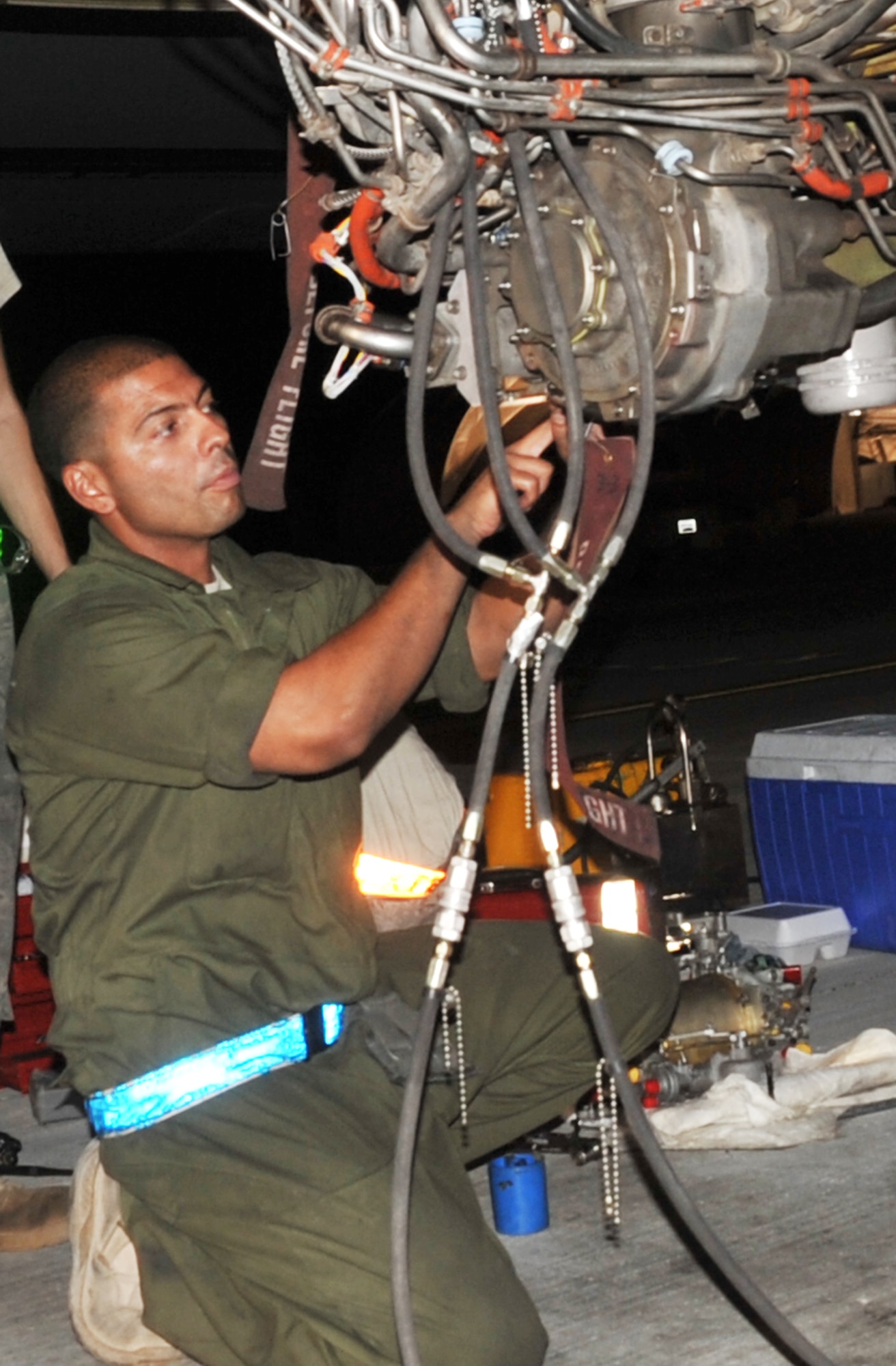 Staff Sgt. Jose Cabiya, an aerospace propulsion craftsman with the 380th Expeditionary Aircraft Maintenance Squadron Extender aircraft maintenance unit, works on a KC-10 Extender during flightline maintenance operations at a non-disclosed base in Southwest Asia on May 1, 2010. He is deployed from the 605th Aircraft Maintenance Squadron, 305th Air Mobility Wing, Joint Base McGuire-Dix-Lakehurst, N.J., and his hometown is San Juan, Puerto Rico. (U.S. Air Force Photo/Master Sgt. Scott T. Sturkol/Released)