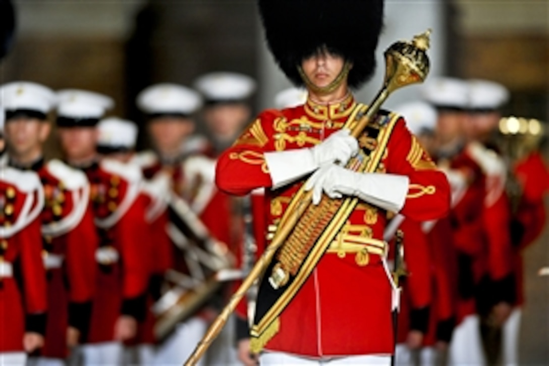 U.S. Marine Corps Master Gunnery Sergeant William L. Browne directs the United States Marine Band during the Evening Parade at Marine Barracks in Washington D.C., April 30, 2010.