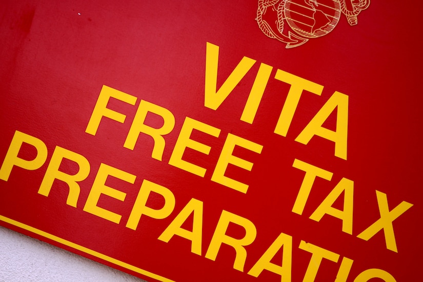 A sign advertises tax preparation services.