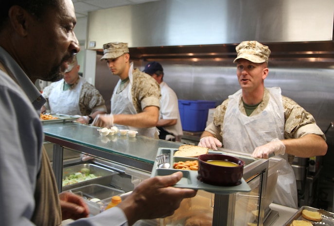 BOSTON - Hometown heroes volunteered and served lunch at the New England Center for Homeless Veterans May 5, 2010. With 900 Marines participating in events throughout the city throughout the week, Marine veteran and president of the NECHV, Laurence D. Fitzmaurice, was happy that this generation of warfighters took the opportunity to volunteer at the center.