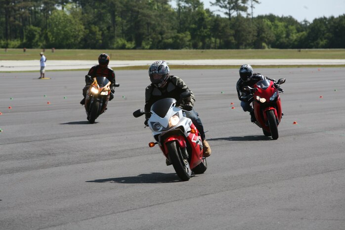 Marines and sailors from Camp Lejeune, N.C., participate in an Advanced Rider Track Day, May 6, 2010, at the Auxiliary Landing Field Bogue, N.C. The event’s purpose was to train the participants and make them more aware of their bike’s limitations and how to prevent accidents.