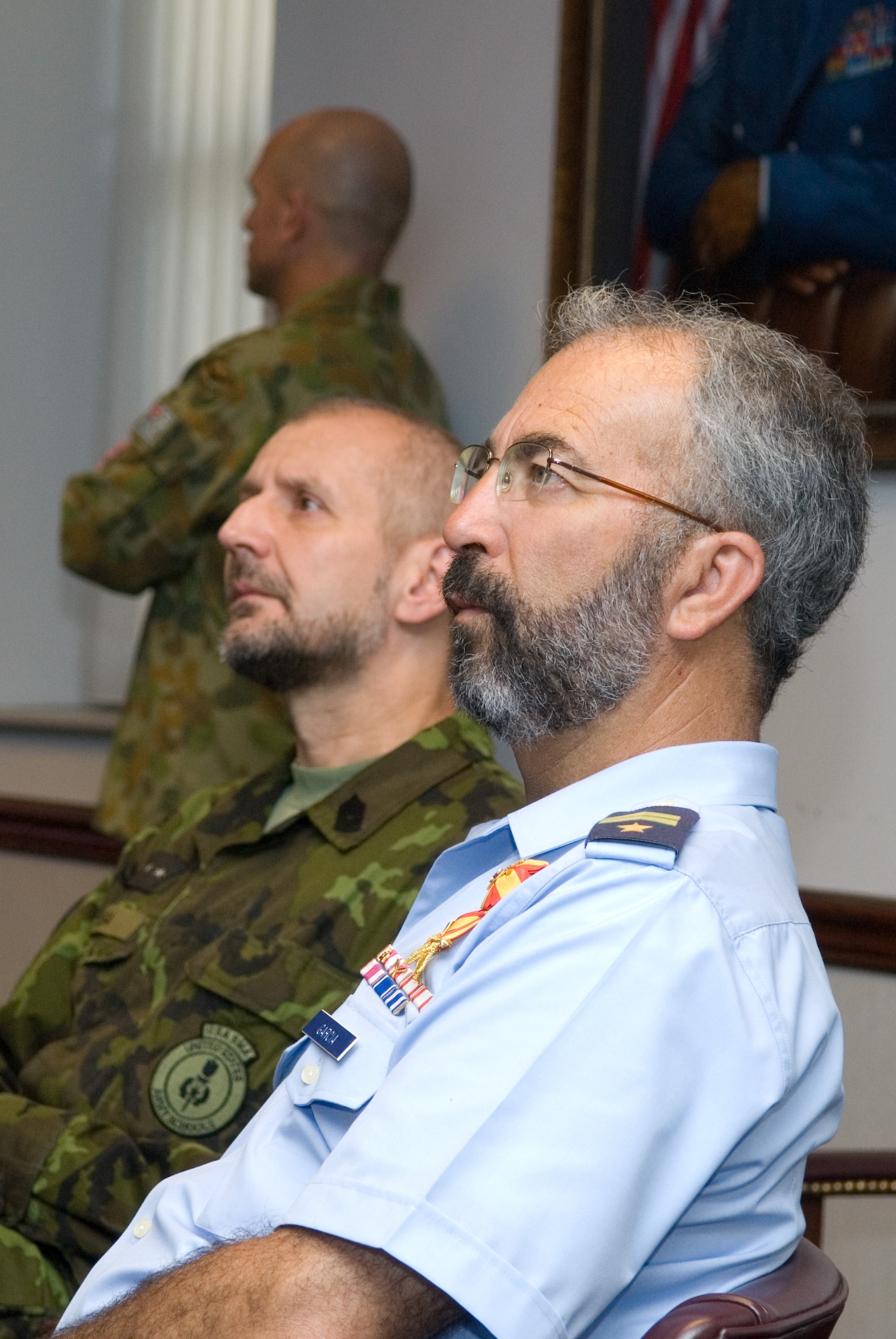 Chief Master Sgt. José García, of the Spanish air force, and Maj. Ludek Kolesa, Czech army command sergeant, listen to a briefing about the educational delivery process of the Thomas N. Barnes Center for Enlisted Education. (U.S. Air Force photo/Bennett Rock)

