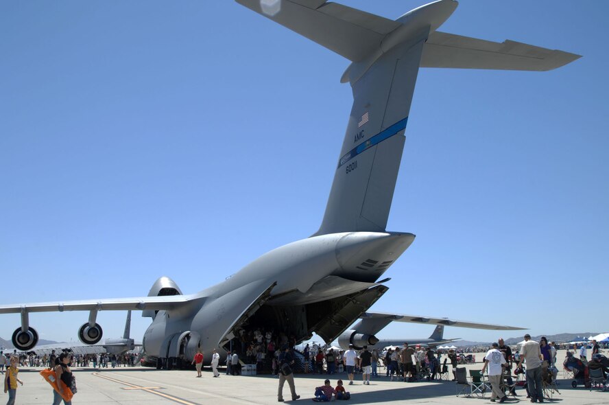 Audience members explore a C-5 static display at the March Field AirFest, March Air Reserve Base, Calif., May 1, 2010. March Field AirFest is a two-day event featuring performances and static displays of civilian and military aircraft. (U.S. Air Force photo by Senior Master Sgt. Kim Allain/Released)