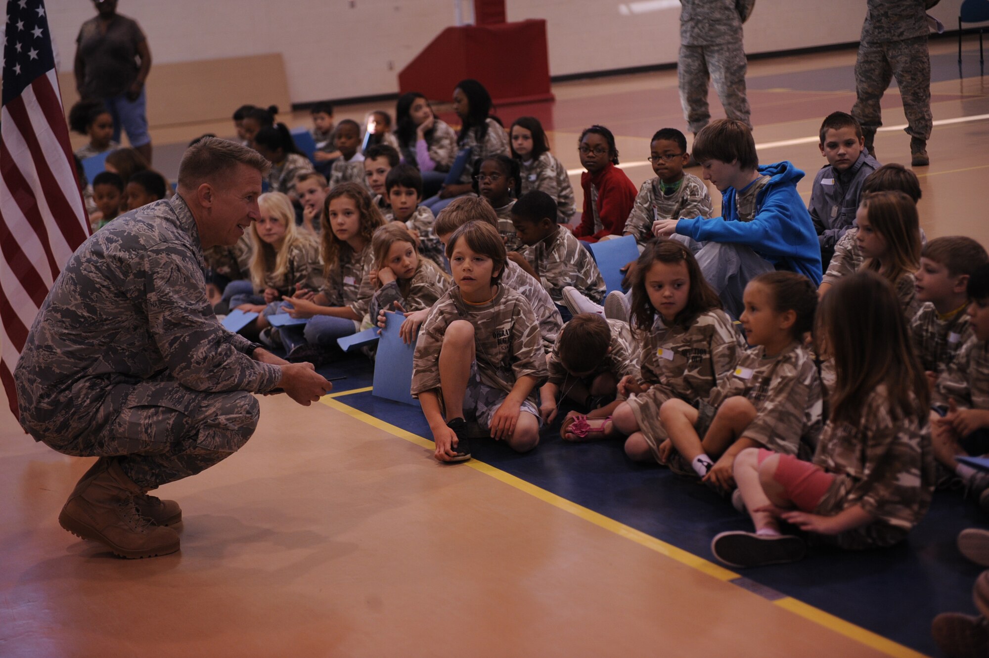 SEYMOUR JOHNSON AIR FORCE BASE, N.C. -- Col. Patrick Doherty speaks to children participating in Operation Bug Out at the youth center April 30, 2010. Colonel Doherty spoke to the youth about the Air Force core values and what it means to be part of the Air Force family. Colonel Doherty, 4th Fighter Wing commander, is from Bellevue, Neb. (U.S. Air Force photo/Senior Airman Ciara Wymbs) 
