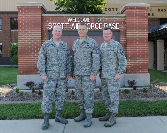 SCOTT AIR FORCE BASE, Ill. -- Colonel Goldstone, Chief Master Sgt. of the Air Force James Roy, and Chief Suttles in front of Base Operations at Scott AFB during Chief Roy’s visit November 2009. (U.S. Air Force photo by Staff Sgt. Paul Villanueva)
