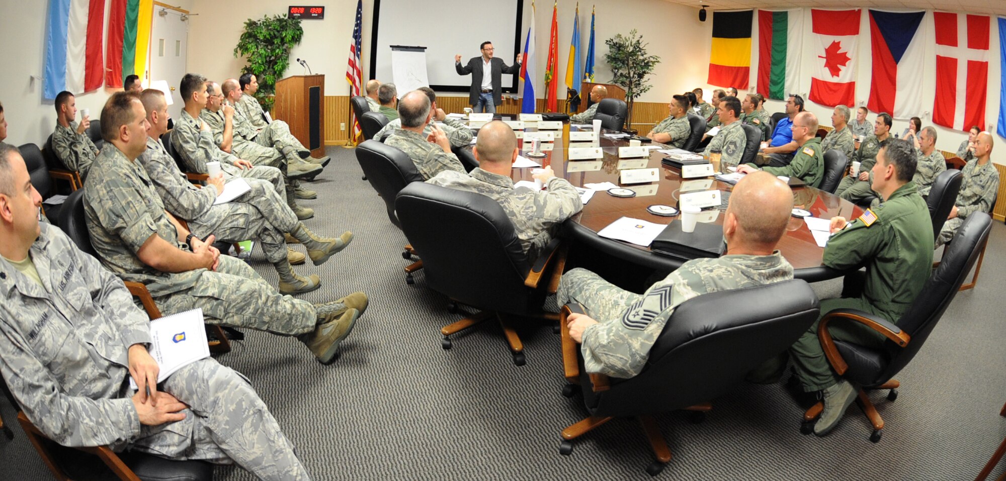 Simon Sinek, a motivational speaker and author, discusses the ability to view a situation from different perspectives to the 22nd Air Refueling Wing leadership during an meeting April 29, 2010, McConnell Air Force Base, Kan.  Mr. Sinek’s speech focused on the importance of an organization’s structure and how to motivate people who work within the organization. Sinek has spoken at various bases around the world, hoping to enhance the Air Force’s future by teaching Airmen the art of inspiring people. (U.S. Air Force Photo/Senior Airman Maria Ruiz)