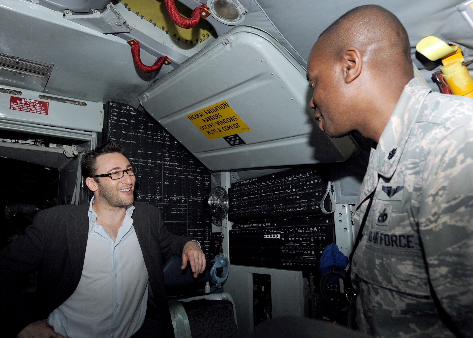 Simon Sinek, a motivational speaker and author of “Start with Why: How Great Leaders Inspire Everyone to Take Action,” discusses  pre-flight information with Lt. Col. Gary Spillman, 22nd Maintenance Group vice commander, April 29, 2010, McConnell Air Force Base, Kan. Mr. Sinek joined Airmen from the 22nd Air Refueling Wing on a KC-135 Stratotanker for a refueling mission. Mr. Sinek has spoken at various bases around the world, hoping to enhance the Air Force’s future by teaching Airmen the art of inspiring people. (U.S. Air Force photo/Airman 1st Class Andrea Salazar)