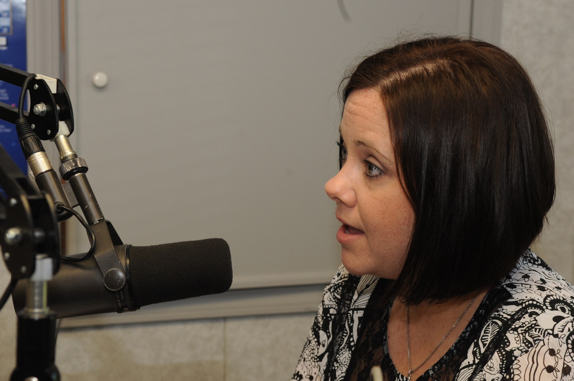 WARRENSBURG, Mo. - Cheryl Dodson, an Air Force widow, speaks to Marion Woods, KOKO radio, during a radio talk show May 4, 2010. Her husband, Capt. Michael Dodson, an Air Force pilot, perished in a B-52 crash off the coast of Guam July 21, 2008. (U.S. Air Force photo/Senior Airman Stephen Linch) 
