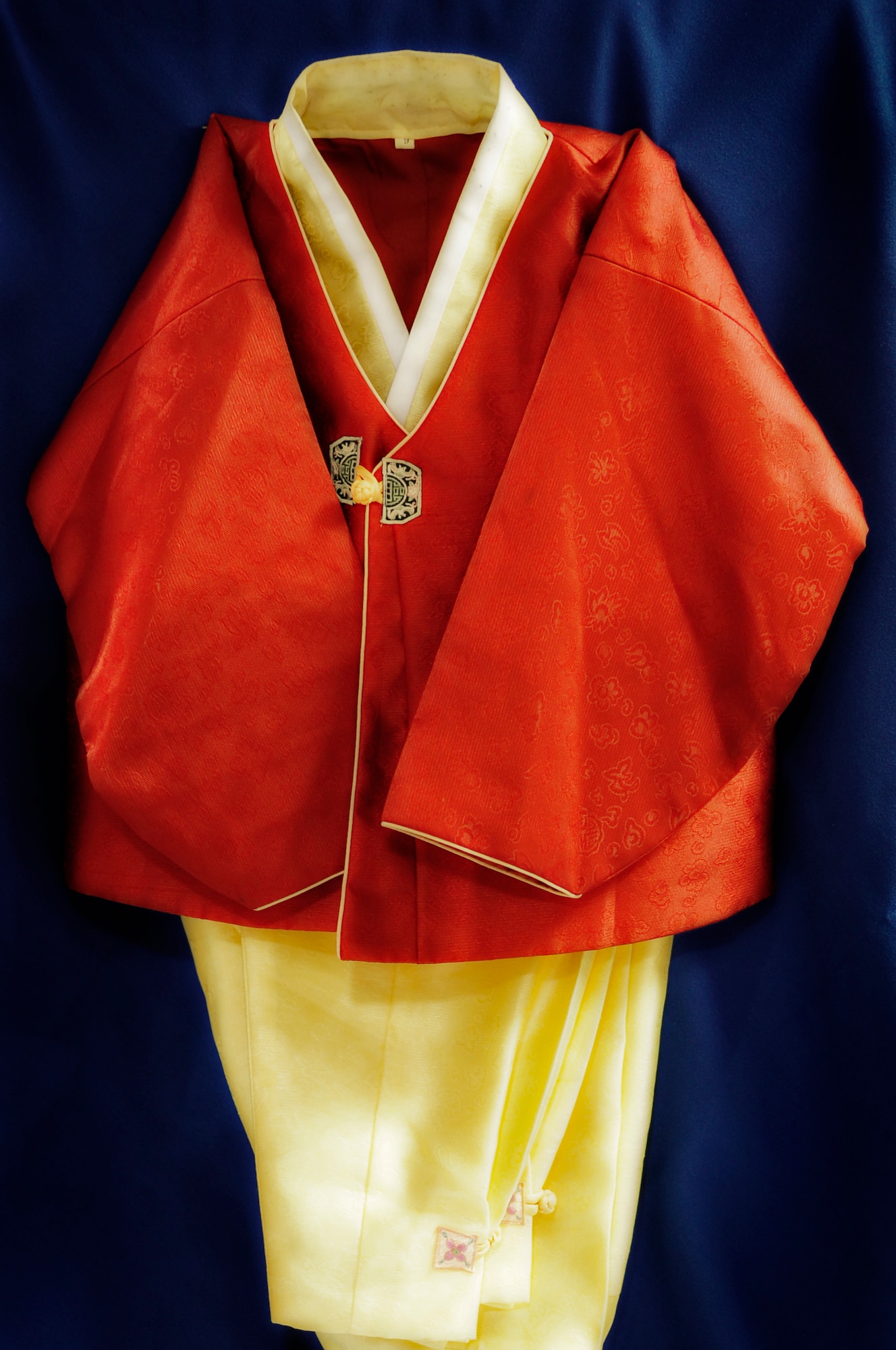 RAF MILDENHALL, England – A child’s garment is shown as part of a larger display at the Gateway Dinning Facility May 6, in observance of Asian and Pacific Islander month.  The events associated with the month draw attention to the culture and its place in Air Force diversity.  (U.S. Air Force photo/Staff Sgt. Christopher L. Ingersoll)