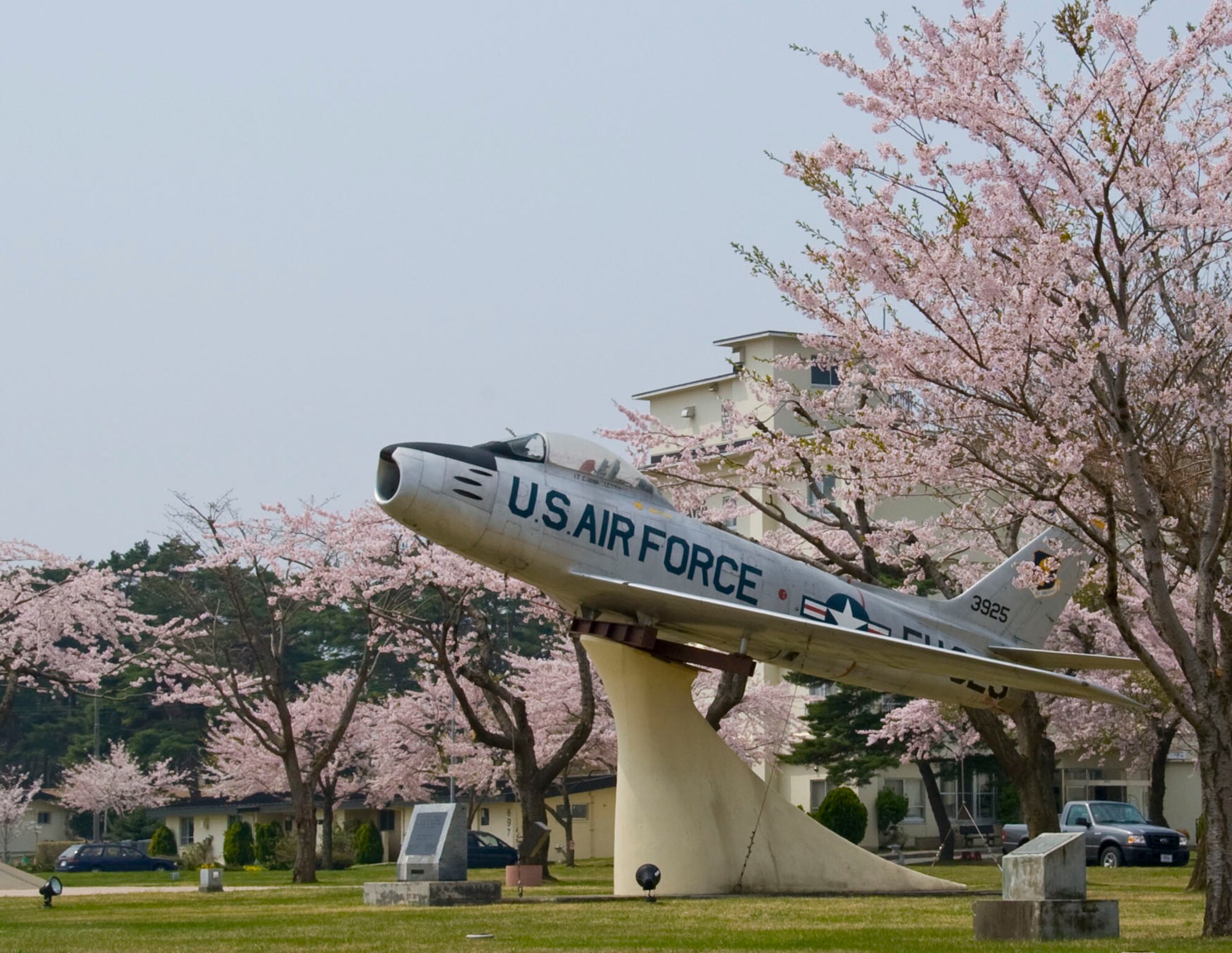 MISAWA AIR BASE, Japan -- Cherry blossoms provide a colorful look to the static display in front of the 35th Fighter Wing headquarter building, May 5.  Cherry blossom trees take a prominent position in Japanese culture. (U.S. Air Force photo/Staff Sergeant Araceli Alarcon)
