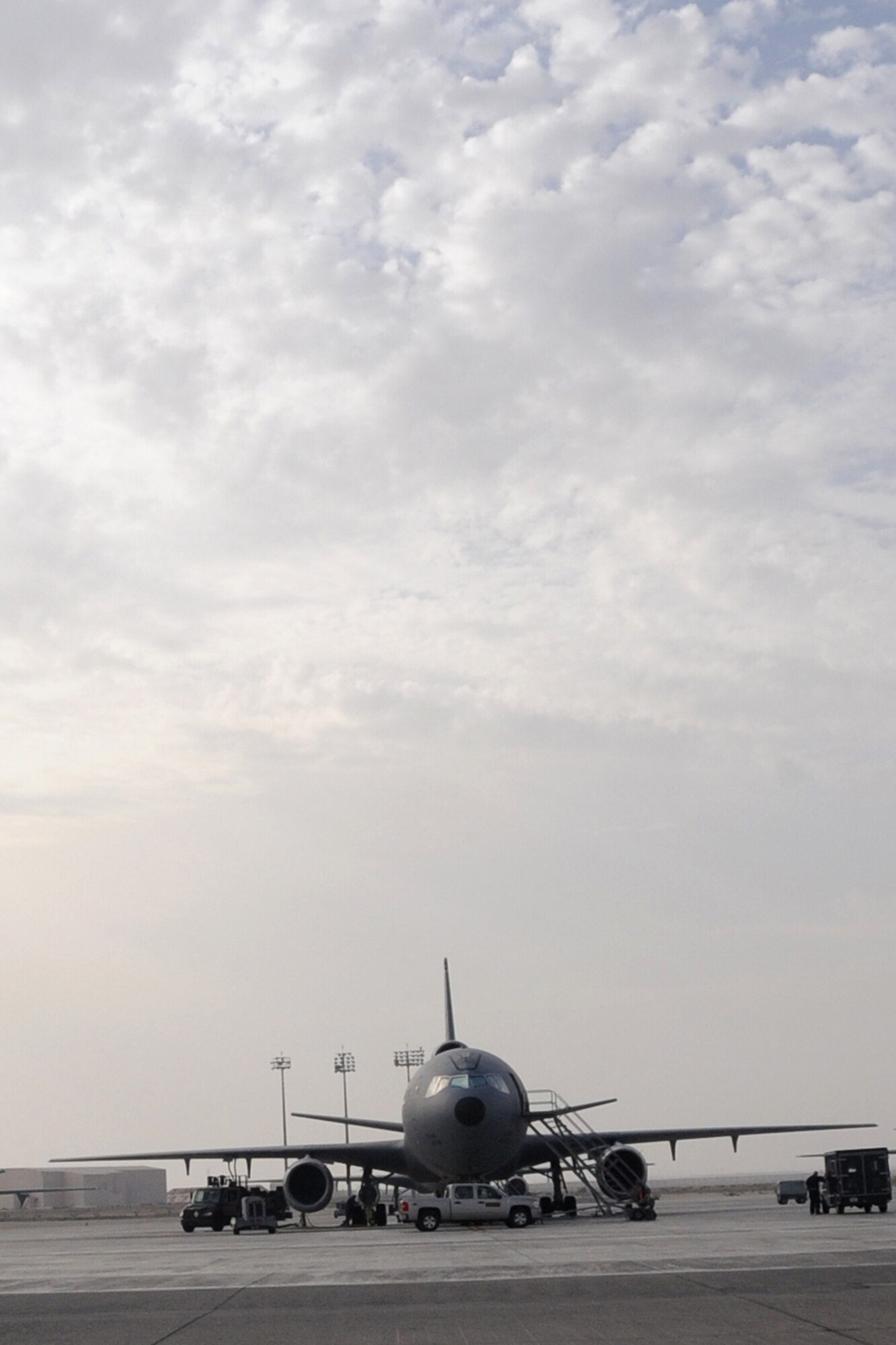 KC-10 Extender sits at an undisclosed location in Southwest Asia on May 5, 2010. The KC-10 Extender is an advanced tanker and cargo aircraft designed to provide increased global mobility for U.S. Armed Forces. In 2009, KC-10s assigned to the 380th Air Expeditionary Wing flew more than 40,000 hours in support of 4,760 combat missions where they offloaded 422,000,000 pounds of fuel to 31,000 aircraft. They provided direct support to more than 2,750 "troops in contact" actions. (U.S. Air Force photo/Senior Airman Jenifer H. Calhoun/Released)
