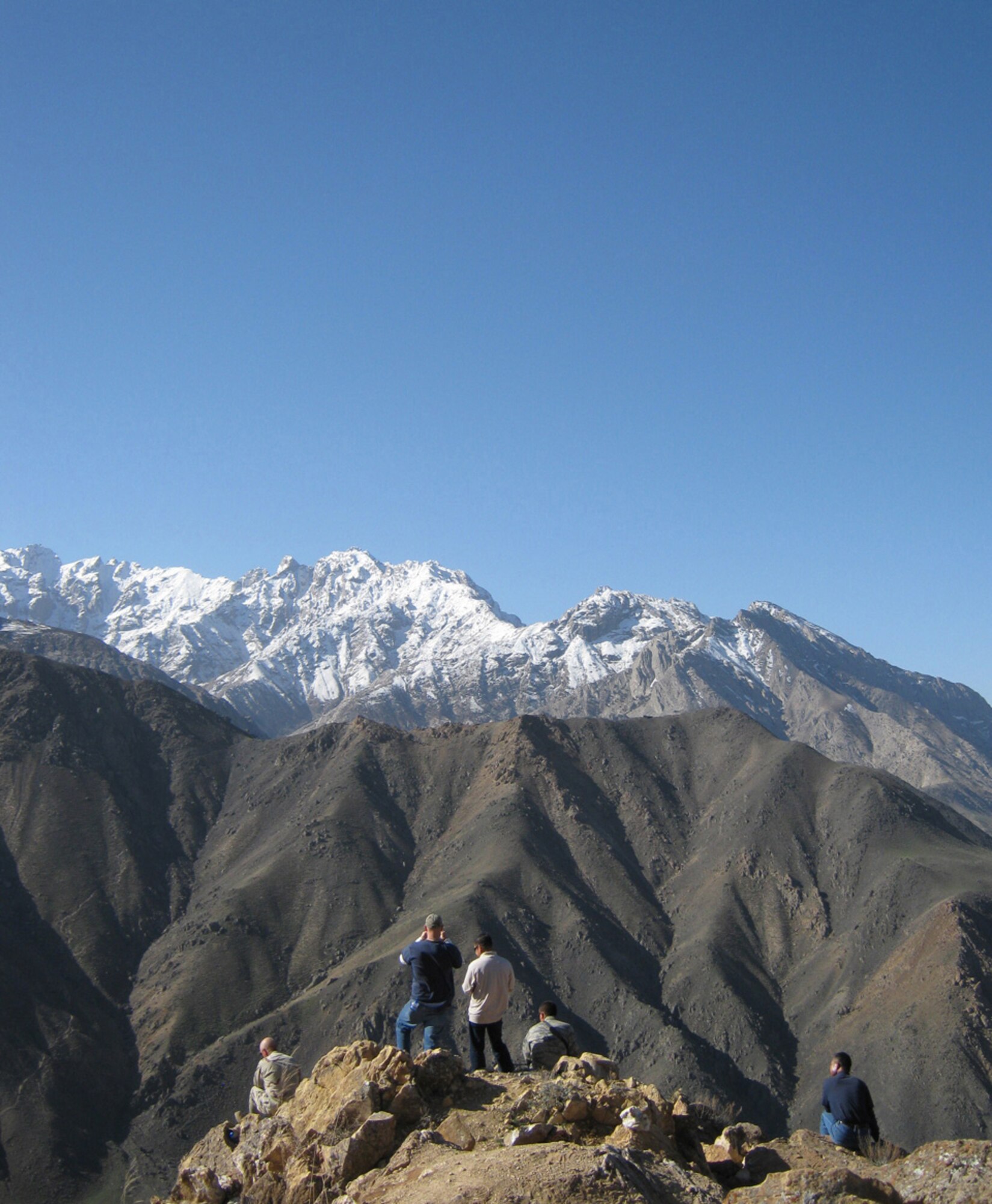 PANJSHIR PROVINCE, Afghanistan - Civilian and military members of Provincial Reconstruction Team Panjshir enjoy the view during one of the PRT?s hikes up a hill near Forward Operating Base Lion. Panjshir, the newest of the 34 provinces in Afghanistan, is the story of a successful, Afghan-led province with good governance, said U.S. Air Force Lt. Col. Curtis Velasquez, PRT Panjshir commander. (Photo by U.S. Air Force 2nd Lt. Jason Smith, Provincial Reconstruction Team Panjshir Public Affairs) 