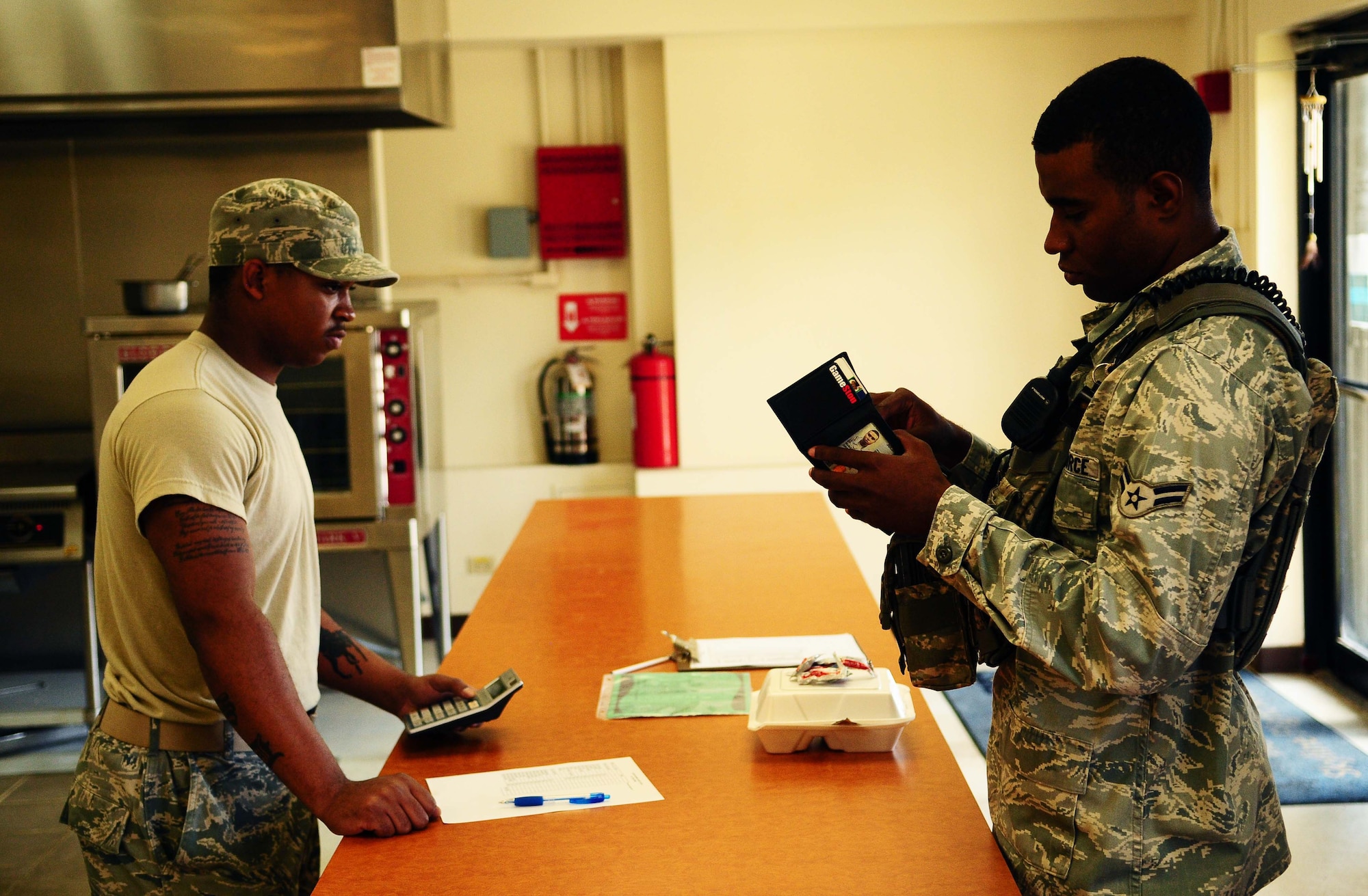 ANDERSEN AIR FORCE BASE, Guam?Airman 1st Class Wendell Gunn performs his daily duties at the Andersen Flight Kitchen, here on May 6, 2010. The Flight Kitchen is a new addition to the 36th Force Support Squadron. It opened June of last year and offers another meal option to team Andersen, especially those working on the flight line. (U.S. Air Force photo by Airman 1st Class Jeffrey Schultze)