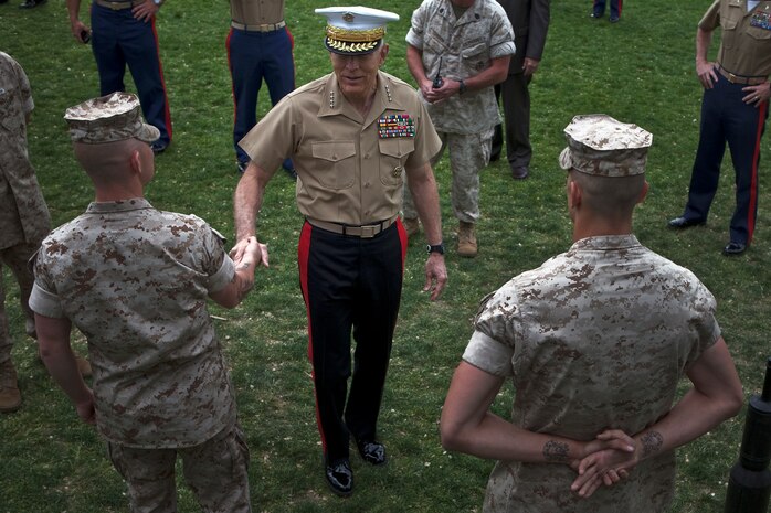 Gen. James T. Conway, commandant of the Marine Corps greets Marines from 4th Tank Battalion to thank them for their hard work during Marine Week Boston May 6, 2010. Marine Week gives the Boston public an opportunity to engage Marines that perform a wide array of jobs in support of the nation's defense.