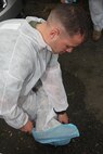 Lance Cpl. Dustin Humphreys of 3rd Battalion, 24th Marines, Johnson City, Tenn., prepares to pain the front parch in an effort to help renovate the Robert J. Watson House, in Cambridge, Mass., in support of Marine Week Boston, May 6, 2010. Once Renovated, the Robert J. Watson House will be used as a shelter for troubled youth females.
