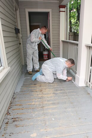 Cpl. Seth Lane (left) and Lance Cpl. Dustin Humphreys (right) of 3rd Battalion, 24th Marines, Johnson City, Tenn., paint the front porch in an effort to help renovate the Robert J. Watson House, in Cambridge, Mass., in support of Marine Week Boston, May 6, 2010. Once Renovated, the Robert J. Watson House will be used as a shelter for troubled youth females.