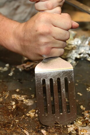 Staff Sgt. Matthew Stout of 3rd Battalion, 24th Marines, Johnson City, Tenn., cleans the kitchen in an effort to help renovate the Robert J. Watson House, in Cambridge, Mass., in support of Marine Week Boston, May 6, 2010. Once Renovated, the Robert J. Watson House will be used as a shelter for troubled youth females.