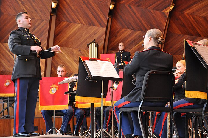 Chief Warrant Officer 2 Christian Flores, Band Officer for the Marine Corps Logistics Base, Albany Marine Band, conducts the band at the Hatch Shell in Boston, May 6, 2010. The MCLB, Albany band performed a number of songs dedicated to the spirit of Boston and strong bond the city has with the Marine Corps.