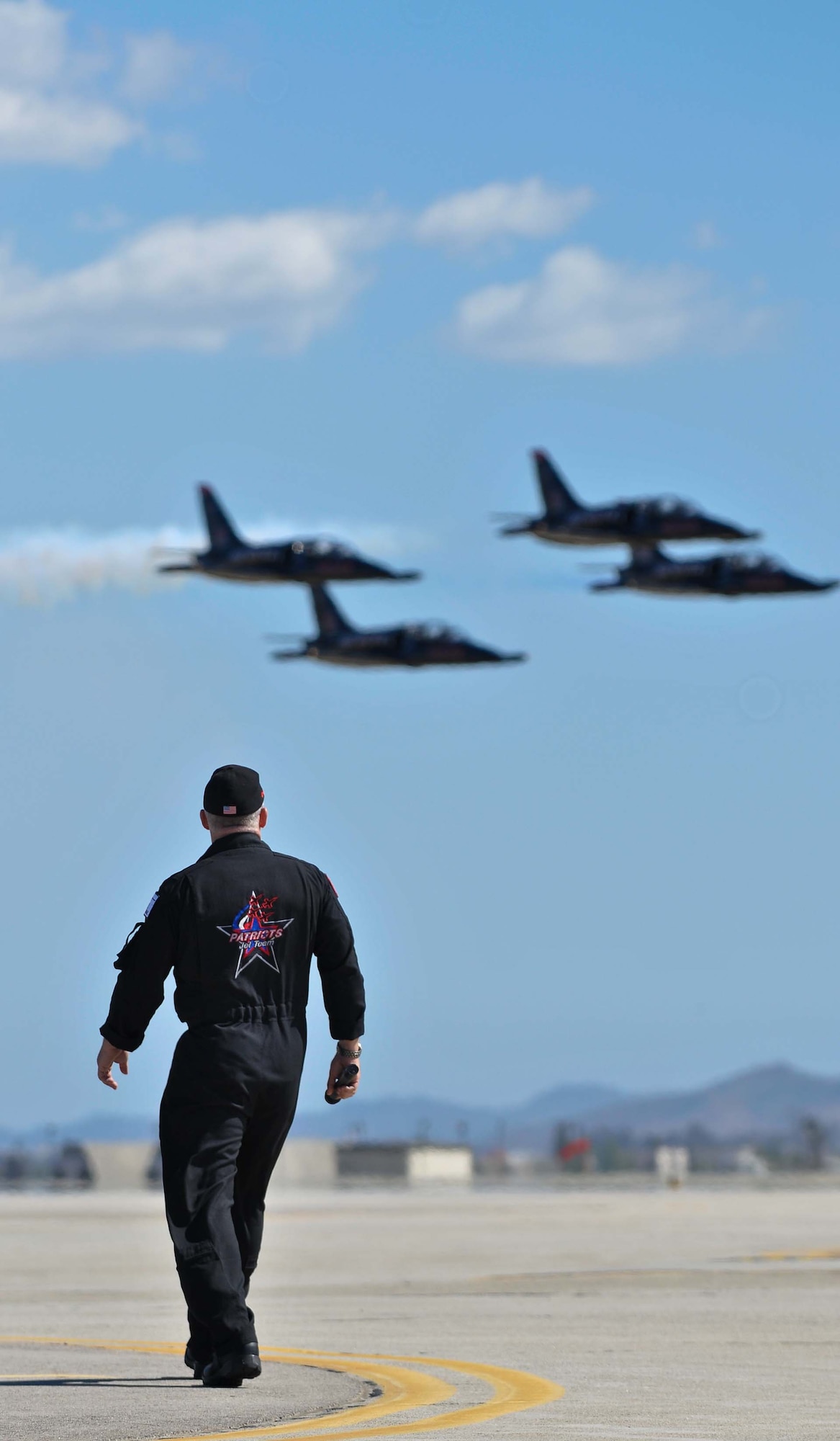 The Patriot jet team performs at the March Field AirFest, March Air Reserve Base, Calif., May 1, 2010. The AirFest is a bi-annual, two-day event featuring military and civilian aerial performances and static displays of modern and historic aircraft. (U.S. Air Force photo by Senior Airman Juan Duenas/Released)