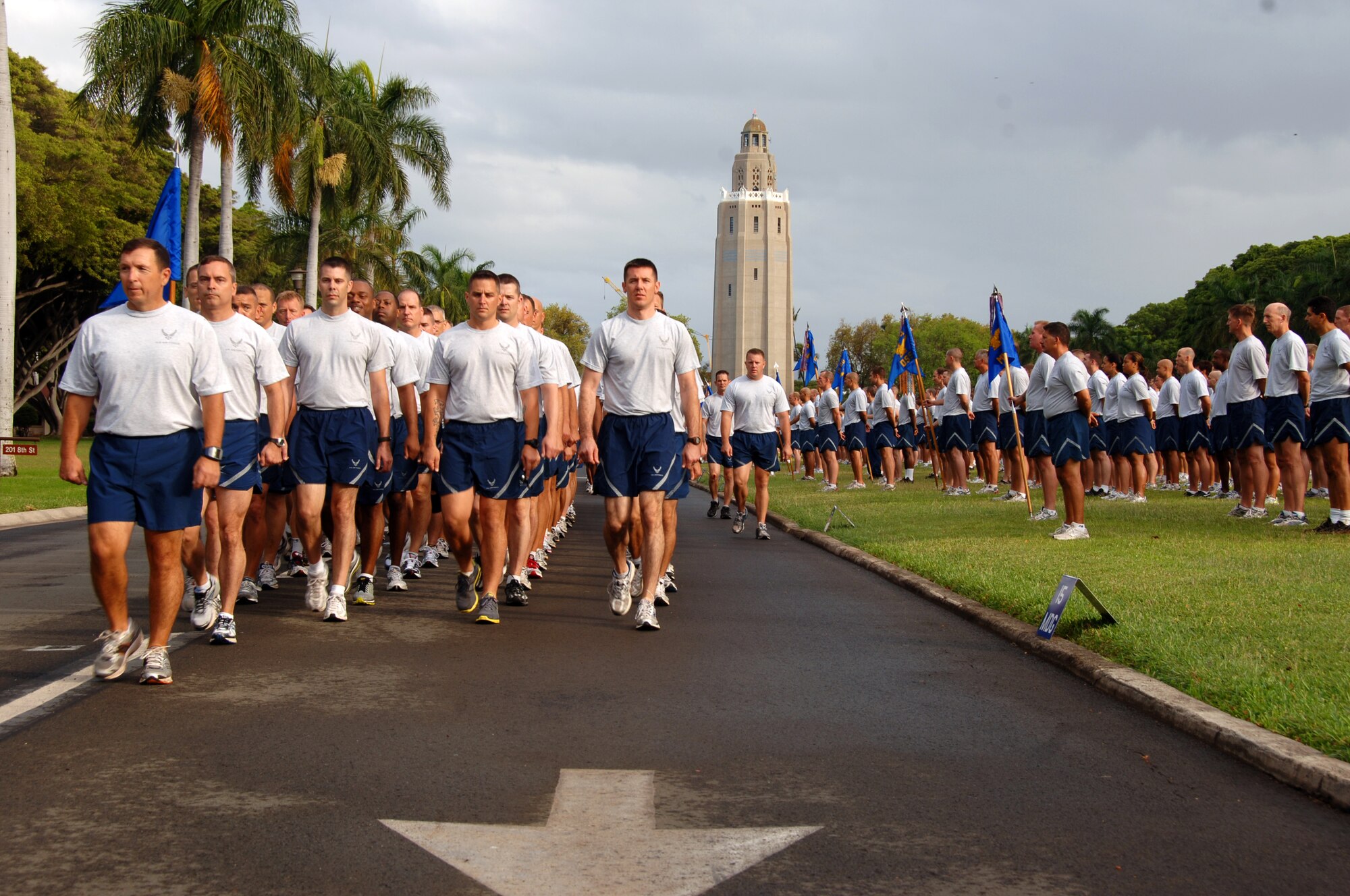 Members of Pacific Air Forces lead the formation at the "Warrior Run" May 7 at Joint Base Pearl Harbor Hickam, Hi. Participants were addressed by Col. Giovanni Tuck, 15th Airlift Wing Commander before beginning the run - Col. Tuck's last as 15th AW commander. (U.S. Air Force photo by Senior Airman Nathan Allen)