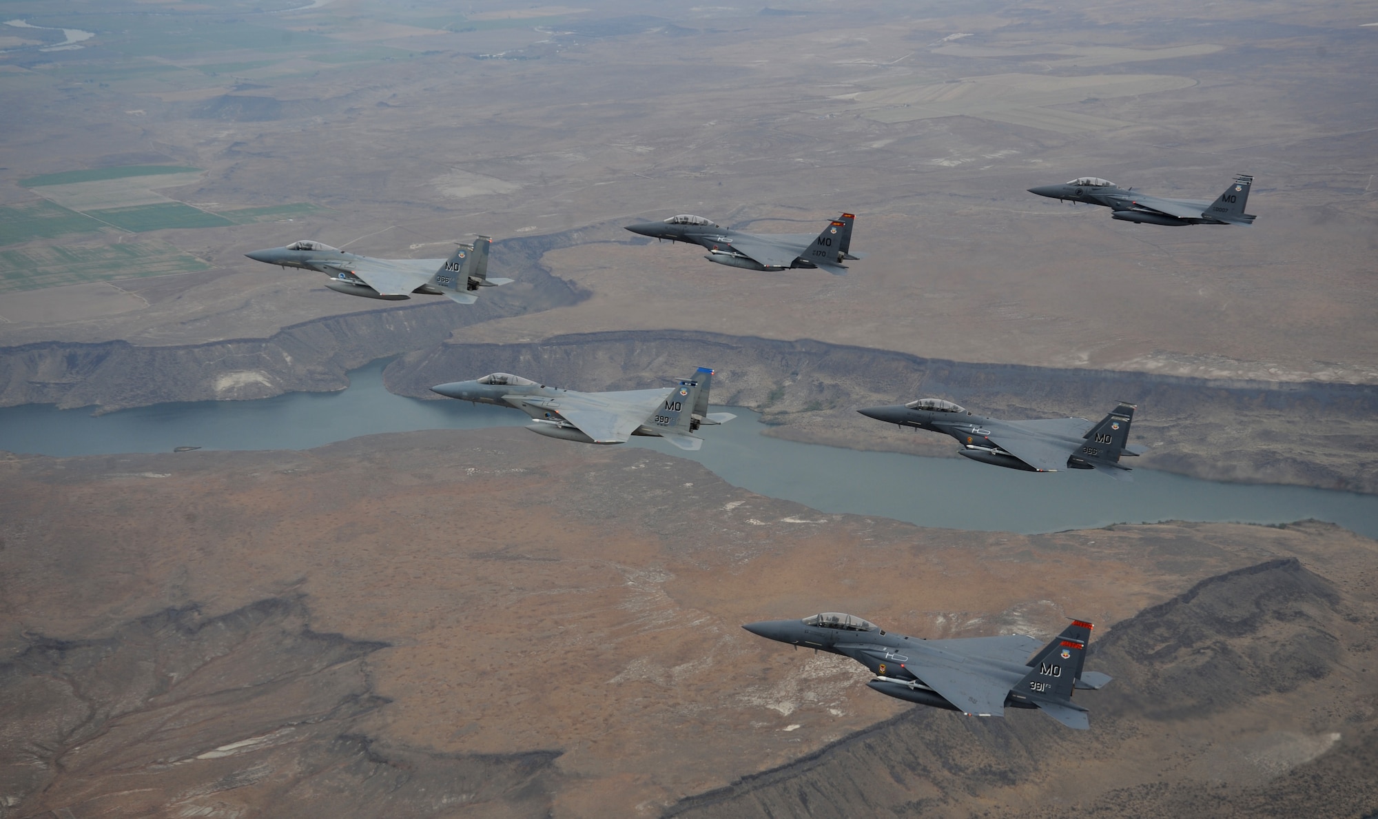 OVER IDAHO - A six-ship formation of F-15C Eagle and F-15E Strike Eagles fly over the Sawtooth Mountains of Idaho Oct. 13. (U.S. Air Force photo by Master Sgt. Kevin J. Gruenwald)