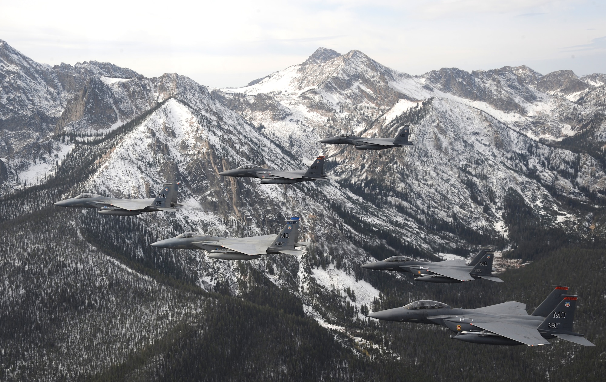 OVER IDAHO - A six-ship formation of F-15C Eagle and F-15E Strike Eagles fly over the Sawtooth Mountains of Idaho Oct. 13. (U.S. Air Force photo by Master Sgt. Kevin J. Gruenwald)