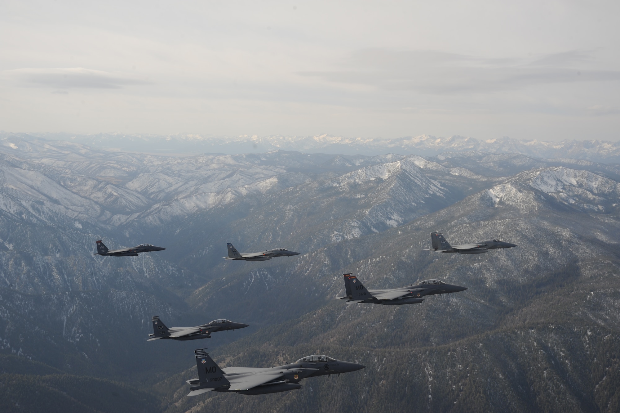 OVER IDAHO - A six-ship formation of F-15C Eagle and F-15E Strike Eagles fly over the Sawtooth Mountains of Idaho Oct. 13. (U.S. Air Force photo by Master Sgt. Kevin J. Gruenwald)
