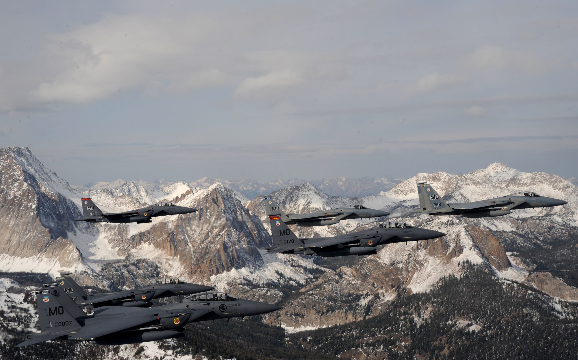 OVER IDAHO - A six-ship formation of F-15C Eagle and F-15E Strike Eagles fly over the Sawtooth Mountains of Idaho Oct. 13. (U.S. Air Force photo by Master Sgt. Kevin J. Gruenwald)