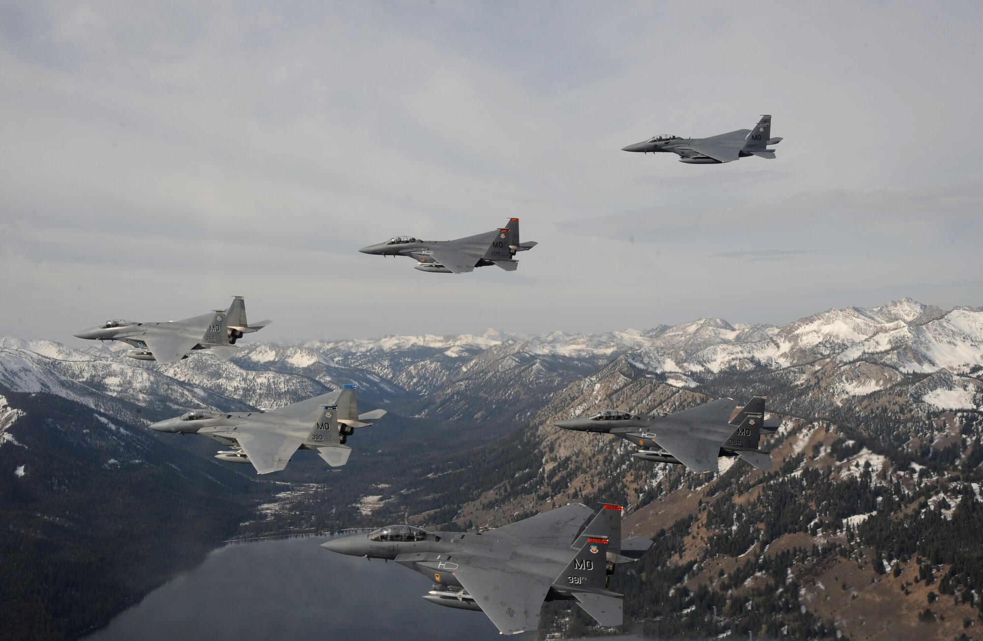 OVER IDAHO - A six-ship formation of F-15C Eagle and F-15E Strike Eagles fly over the Sawtooth Mountains of Idaho Oct. 13. (U.S. Air Force photo by Master Sgt. Kevin J. Gruenwald)