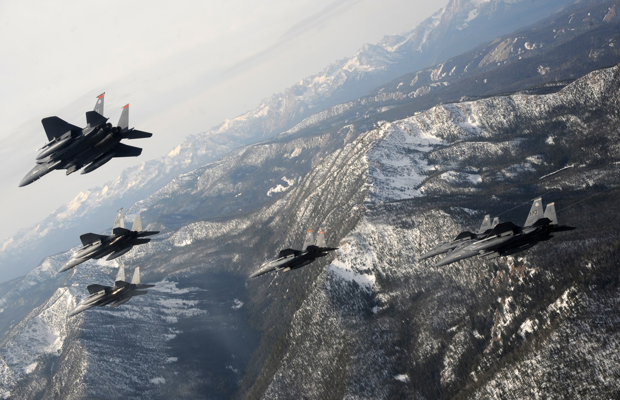 OVER IDAHO - A six-ship formation of F-15C Eagle and F-15E Strike Eagles fly over the Sawtooth Mountains of Idaho Oct. 13. (U.S. Air Force photo by Master Sgt. Kevin J. Gruenwald)