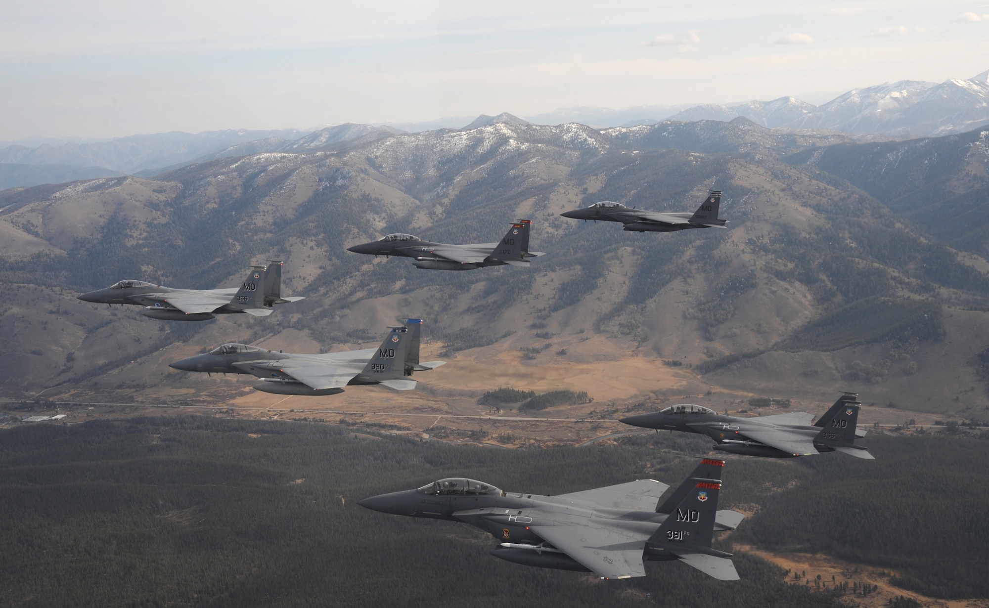 OVER IDAHO - A six-ship formation of F-15C Eagle and F-15E Strike Eagles fly over the Sawtooth Mountains of Idaho Oct. 13. (U.S. Air Force photo by Master Sgt. Kevin J. Gruenwald)