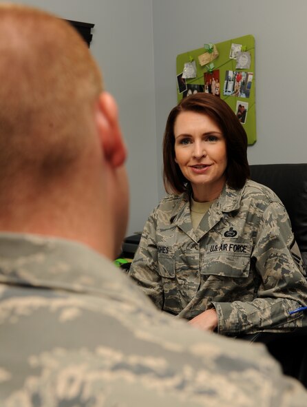 MOODY AIR FORCE BASE, Ga. -- Master Sgt. Heather Hughes, 23rd Force Support Squadron career assistance advisor, meets with Senior Airman Steven Wilson, 723rd Aircraft Maintenance Squadron C-130 engine mechanic, to discuss possible decisions for cross-training here May 7. Sergeant Hughes meets and counsels Airmen who want to make career changes. (U.S. Air Force photo by Airman 1st Class Benjamin Wiseman/RELEASED)