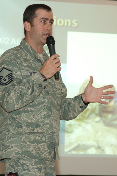 HANSCOM AIR FORCE BASE, Mass. - Master Sgt. Christopher Spann, a Joint Terminal Attack Controller, speaks about the Tactical Air Control Party career field, as well as its origins and enhancements during the Heritage of Freedom event at the Minuteman Club on April 28. He also touched on the missions he's done over four combat tours during his presentation. The Heritage of Freedom speaker series is held quarterly and features three speakers, each of whom discuss their experiences serving in combat or while deployed. Their hard-hitting 15 to 20 minute presentations are followed by short question and answer periods. (U.S. Air Force photo by Rick Berry)