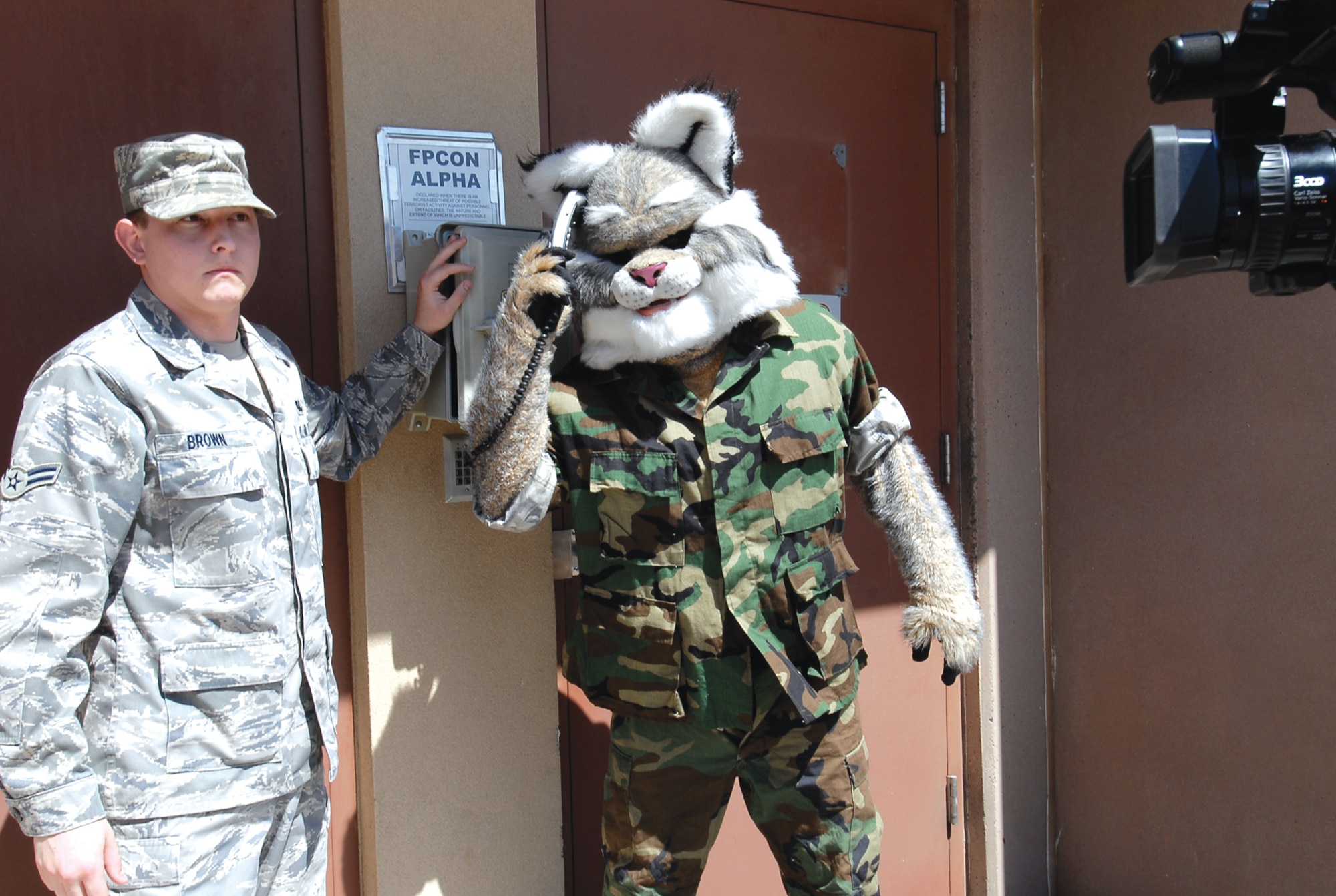 Baxter the Bobcat performed a skit April 27 at the Air Traffic Control Tower during his visit. Baxter and his team of videographers shot footage that will be aired July 4 Military Appreciation Day at Chase Field as the Diamondbacks play the Los Angeles Dodgers. (U.S. Air Force photo by Airman 1st Class Ronifel Yasay)