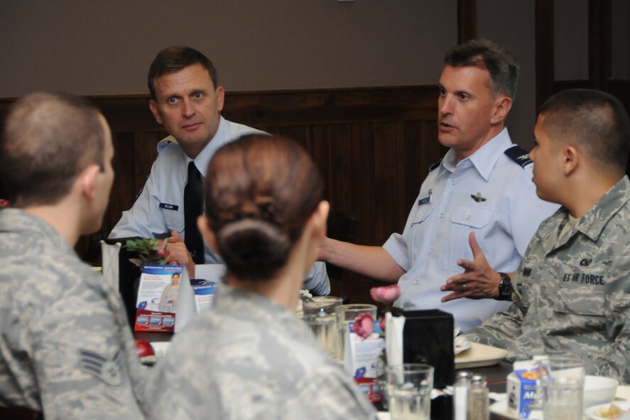 Col. Randall Odgen, 916th Air Refueling Wing commander, talks with junior enlisted members of the wing shortly after his change of command. Command Chief Greg Nelson also joined the luncheon which included Maj. Gen. Eric Crabtree and 10 enlisted Airmen from the wing. (USAF photo by TSgt. Scotty Sweatt, 916ARW/PA)