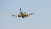 Lt. Col. William "Hoover" Engleson, fighter pilot with the 332nd Expeditionary Fighter Squadron, takes off with the afterburner lit in an F-16C+ Fighting Falcon from Joint Base Balad, Iraq on May 4, 2010. Aircraft maintenance and crew chiefs from the 177th Fighter Wing, NJ Air National Guard helped prepare the aircaft for launch. (U.S. Air Force photo by Master Sgt. Andrew J. Moseley/Released) 