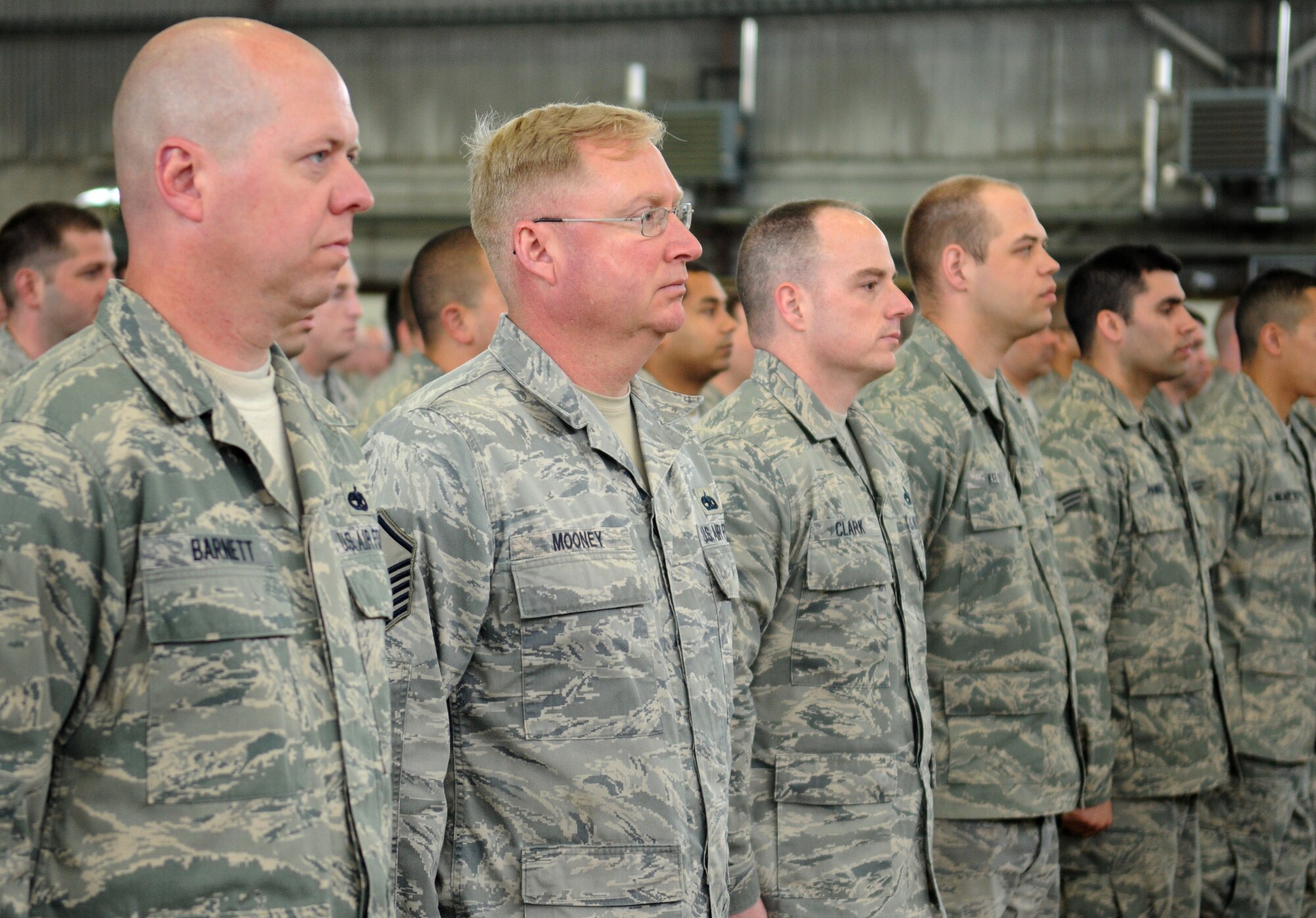 SPANGDAHLEM AIR BASE, Germany – Airmen from the 52nd Maintenance Group stand at attention as Lt. Gen. Loren Reno, Deputy Chief of Staff for Logistics, Installations and Mission Support, reads the citation for the Daedalian trophy May 5. The 52nd MXG was recognized as the best maintenance group in the Air Force, earning the 2009 Maj. Gen. Clements McMullen Memorial Daedalian Weapons System Maintenance Award. (U.S. Air Force photo/Senior Airman Nathanael Callon)
