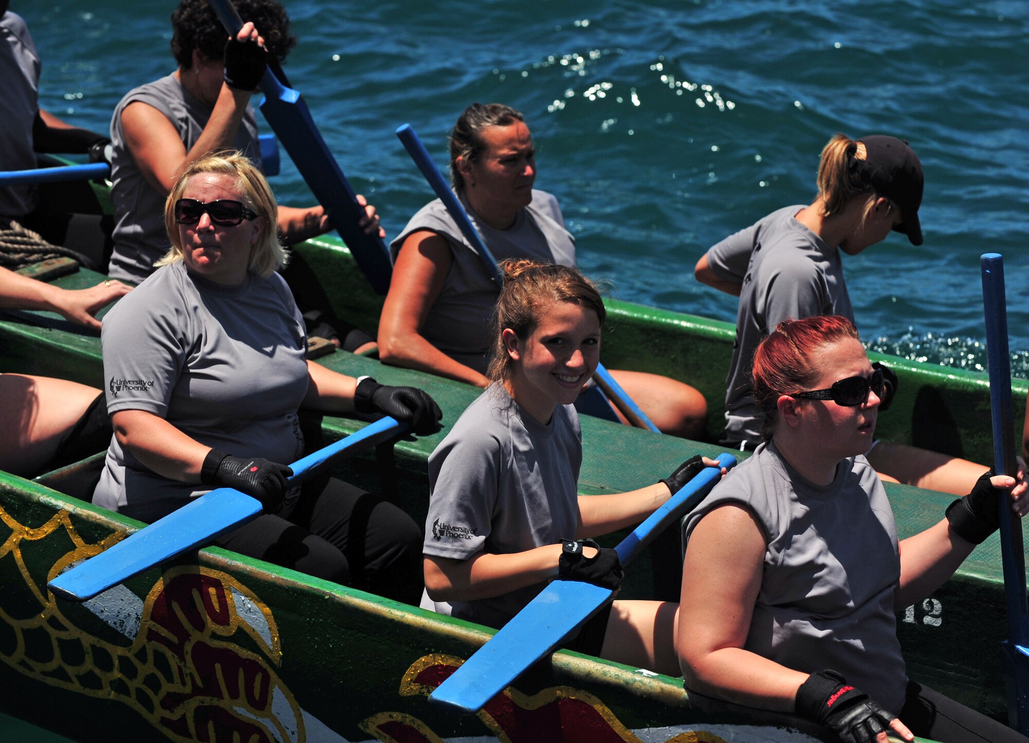 The Kadena Shoguns women's team get ready to face off with two local men's corporate teams during the 36th Annual Naha Dragon Boat Races in Naha City May 5. The women's team finished second in their heat as well as second overall for fastest time among U.S. military teams. "Haari," or dragon boat racing, first came to Okinawa during the 14th Century when China influenced the Ryukyu Kingdom. The modern races involve 32 rowers, a cadence drummer, a navigator, and in most cases, one or two motivators who help the team stay synchronized while racing the 2.5-ton fiberglass ship more than 600 meters to the finish line. (Air Force/Staff Sgt. Jason Lake)