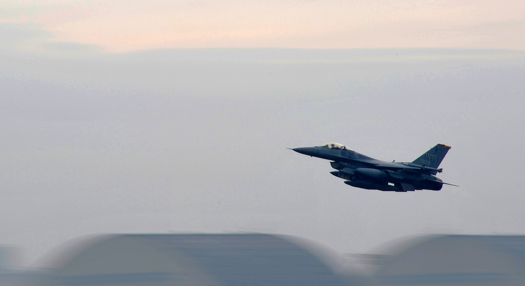 MISAWA AIR BASE, Japan -- An F-16 Fighting Falcon takes off as part of the 14th Fighter Squadron's deployment to the Republic of Korea May 7. The F-16 is a multi-role fighter, capable of conducting a broad range of missions, including precision strike, counter air and close air support. The F-16 also provides added capability in targeting, precision munitions, detection and defensive measures. (U.S. Air Force photo/Staff Sgt. Chad C. Strohmeyer)