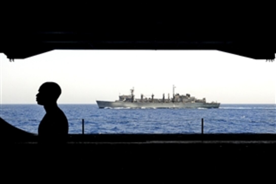 The Military Sealift Command fast combat support Ship USNS Supply is under way alongside the aircraft carrier USS Dwight D. Eisenhower in the North Arabian Sea, May 6, 2010. The Eisenhower is deployed as part of the rotation of forward-deployed forces to support maritime security operations.