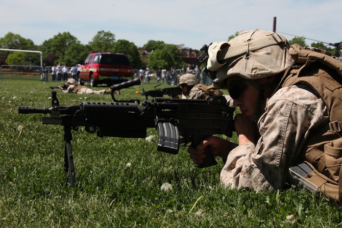 Cpl. Andrew Fields, a Terre Haute, Ind., native and an assaultman with Company K, 3rd Battalion, 24th Marine Regiment, helps provide security around a MV-22 Osprey landing site during a Marine Air-Ground Task Force demonstration at Joe Moakley Park in South Boston May 7, 2010. The exercise was a practice run for a full demonstration May 8 at Carson Beach during Marine Week Boston.