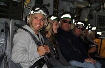 Mike Lowell, third baseman for the Boston Red Sox, and his son, Anthony, enjoy a moment before taking flight in an MV-22 Osprey, May 7, 2010.  Lowell and his teammate, Jocoby Ellsbury, outfielder, visited the base to show their appreciation to the Marines and take a tour of Boston from the sky.  More than 900 Marines have descended on Boston for Marine Week, May 3-9, celebrating the contributions and support Boston has shown for men and women in uniform.