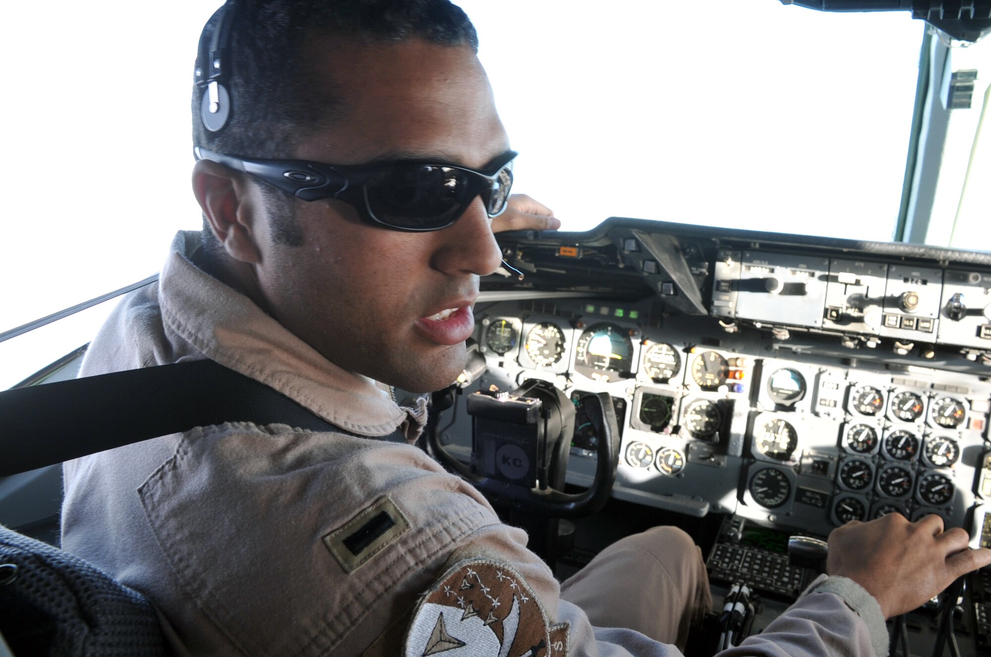 First Lt. Jason Brown, KC-10 Extender tanker pilot with the 908th Expeditionary Air Refueling Squadron, flies a KC-10 on an air refueling mission in the U.S. Central Command area of responsibility in Southwest Asia on April 24, 2010. Lieutenant Brown is deployed from the 2nd Air Refueling Squadron, 305th Air Mobility Wing, Joint Base McGuire-Dix-Lakehurst, N.J., and his hometown is Arvada, Colo. (U.S. Air Force Photo/Master Sgt. Scott T. Sturkol/Released)